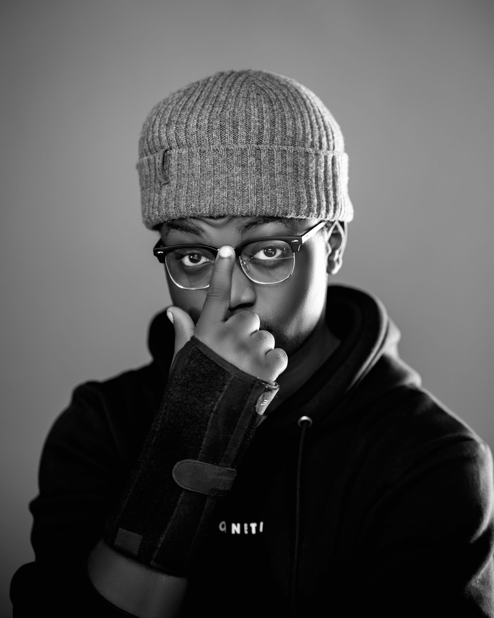 Portrait of a creative director, warm studio lighting, editorial aesthetic